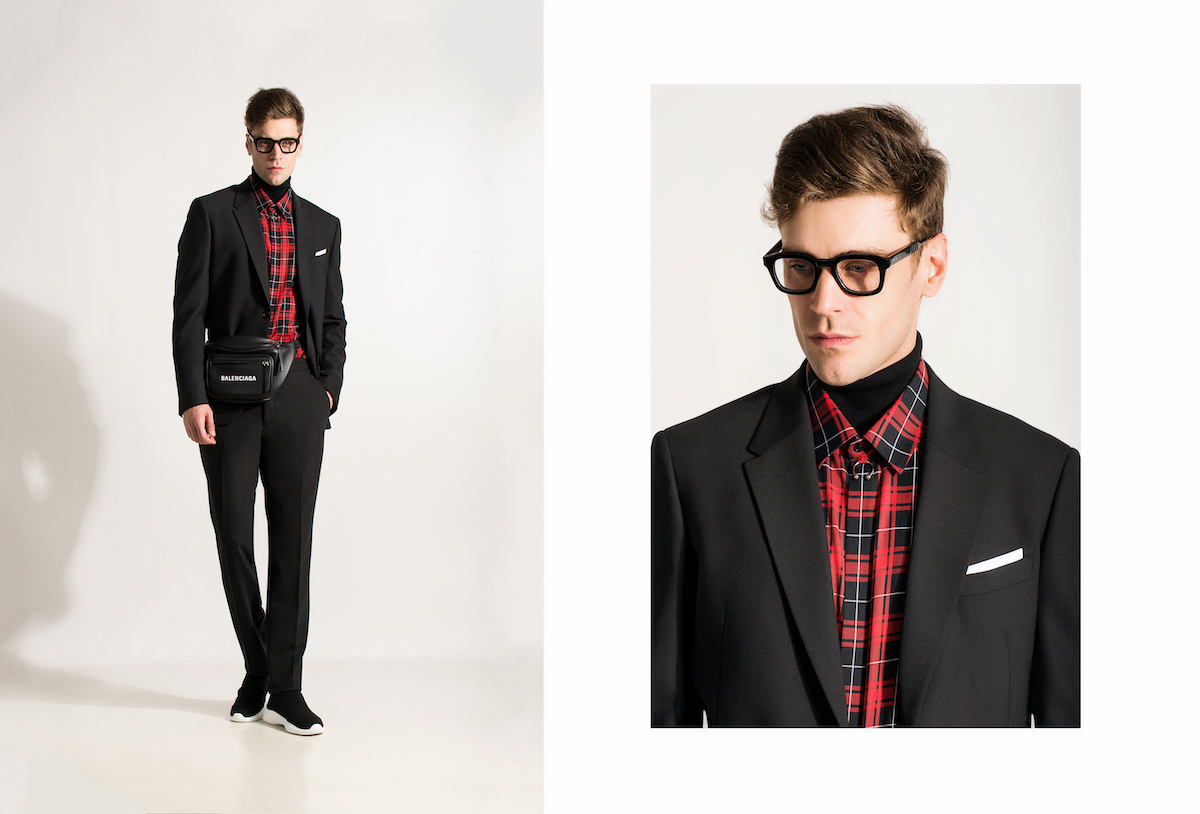 Костюм и рубашка – Neil Barrett, сумка Balenciaga, кроссовки Prada, очки Thom Browne