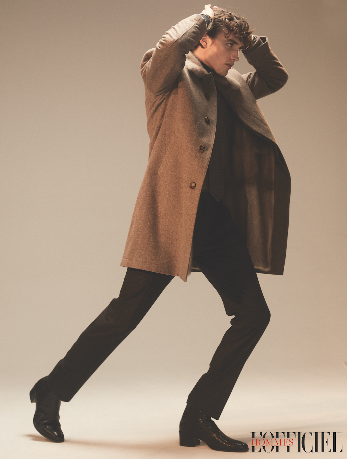 Пальто, костюм – Corneliani; туфли Tom Ford; браслет Cartier